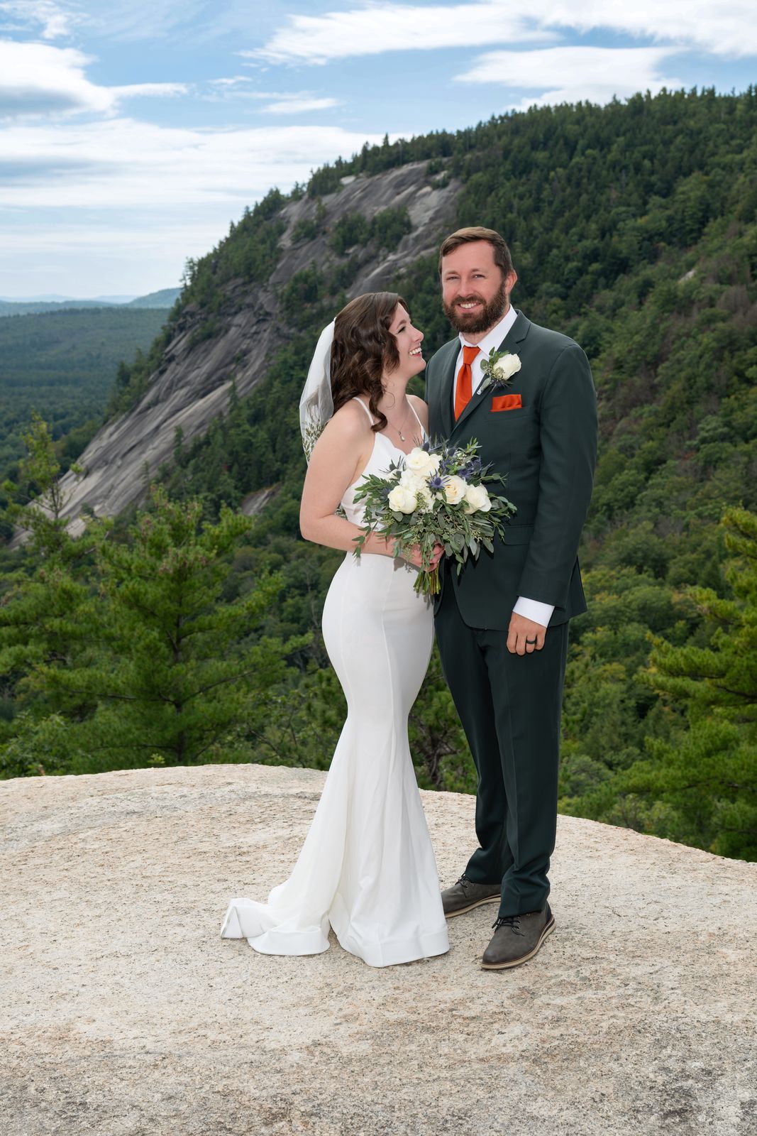 Bride and groom on the cliff top of Cathedral Ledge in North Conway, NH